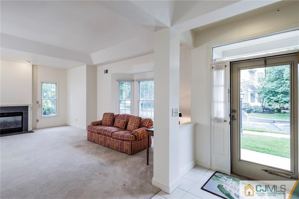 5 Hedge Row Road Plainsboro, NJ 08540 - Photo 2 of 25 a living room with furniture and a fireplace
