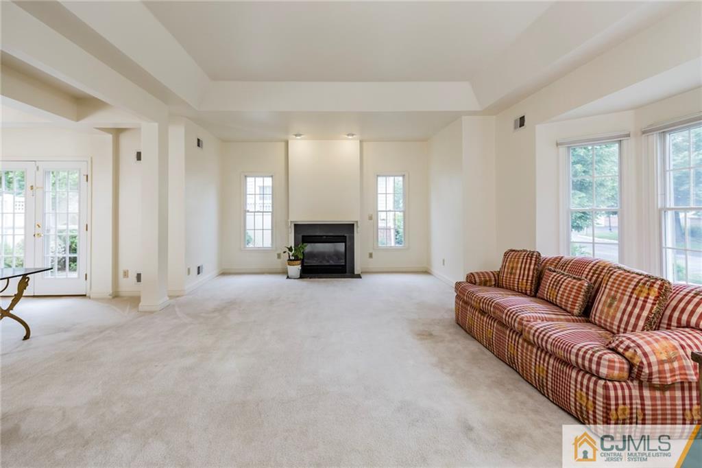 5 Hedge Row Road Plainsboro, NJ 08540 - Photo 3 of 25 a living room with furniture window and a fireplace