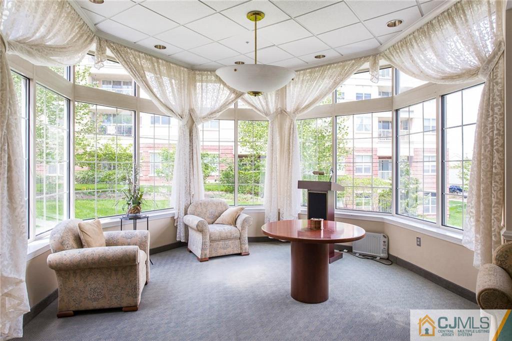 5 Hedge Row Road Plainsboro, NJ 08540 - Photo 24 of 25 a living room with patio furniture and a chandelier