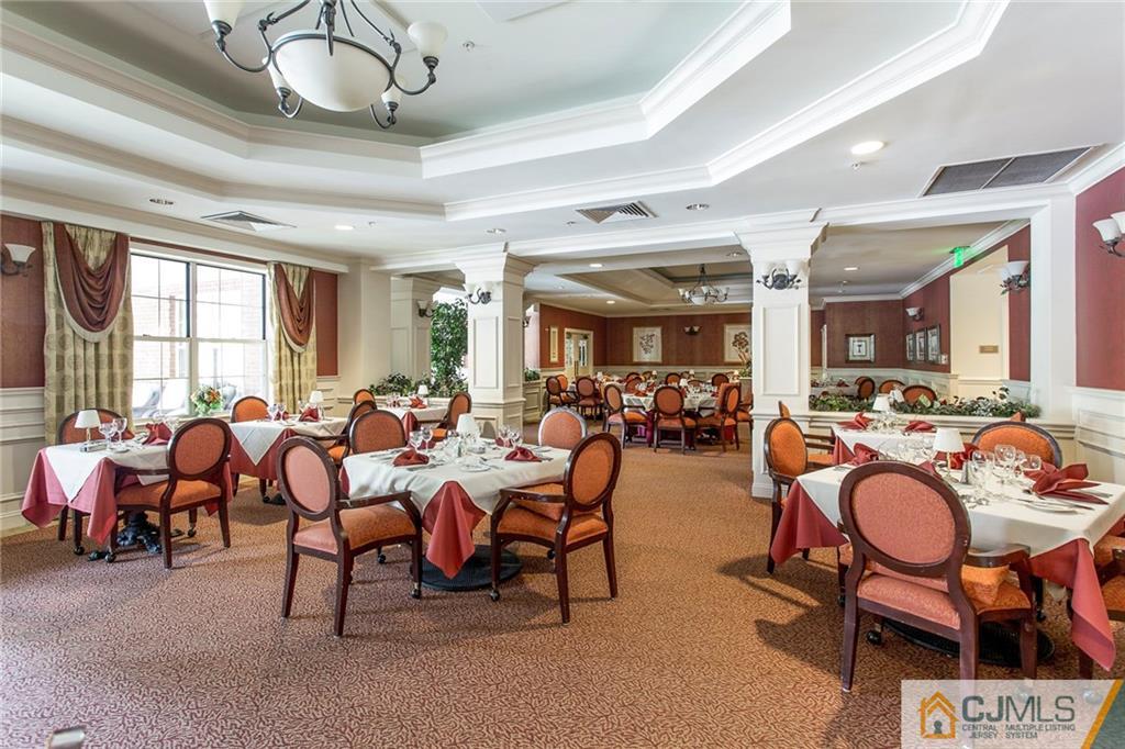5 Hedge Row Road Plainsboro, NJ 08540 - Photo 25 of 25 a large room with lots of tables a chandelier and couches