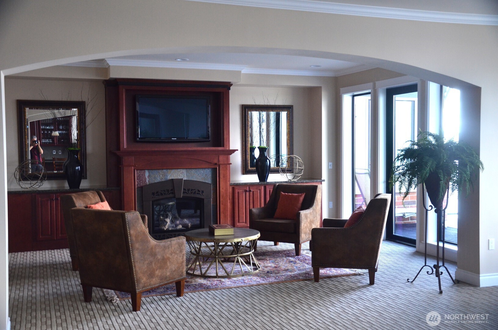 505 Broadway, Unit 802 Tacoma, WA 98402 - Photo 22 of 23 a living room with furniture and a fireplace