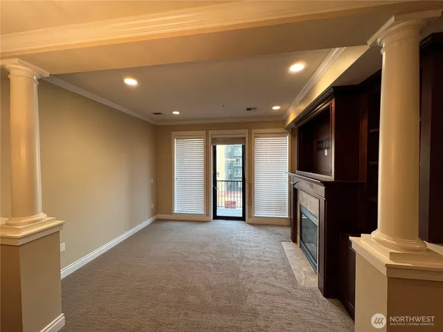 a view of a livingroom with a fireplace