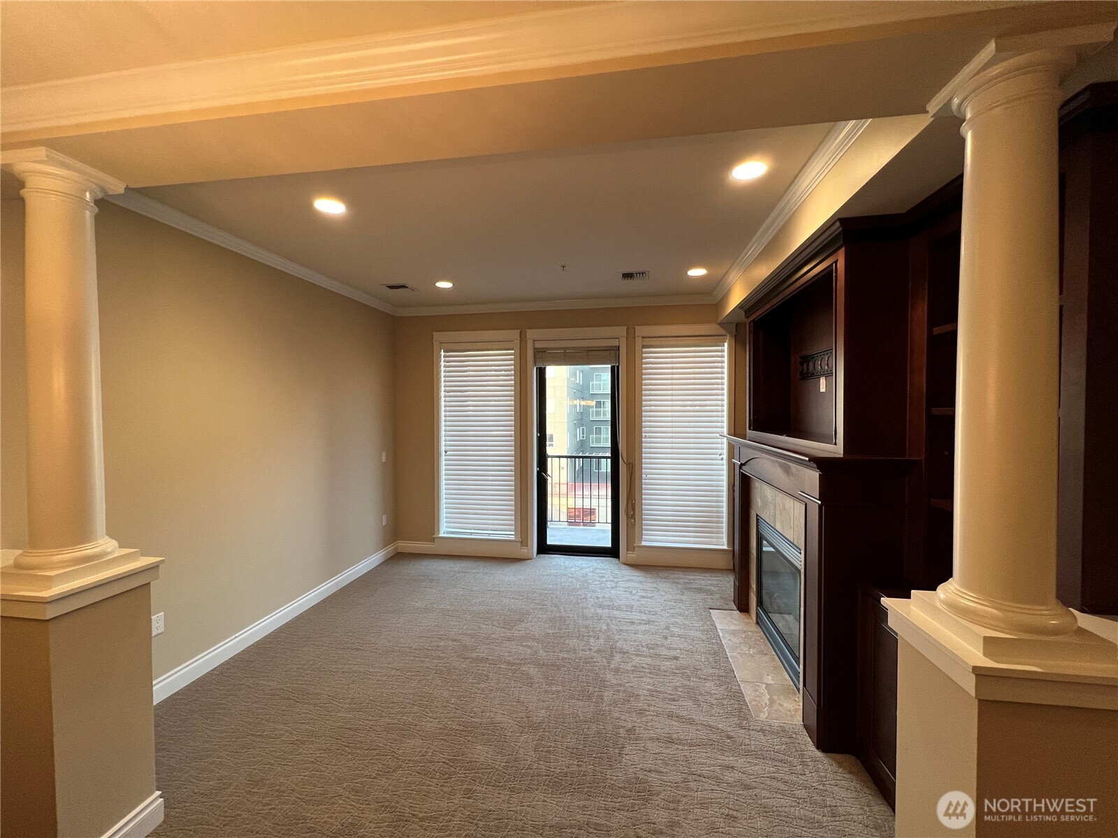505 Broadway, Unit 802 Tacoma, WA 98402 - Photo 8 of 23 a view of a livingroom with a fireplace