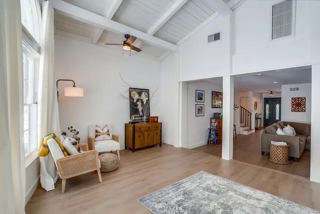 a bathroom with a toilet a sink and a mirror