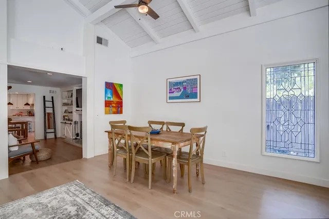 a en suite bathroom with a granite countertop double vanity sink and a mirror