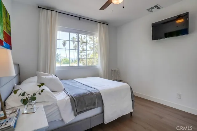 a kitchen with stainless steel appliances granite countertop a sink and a refrigerator