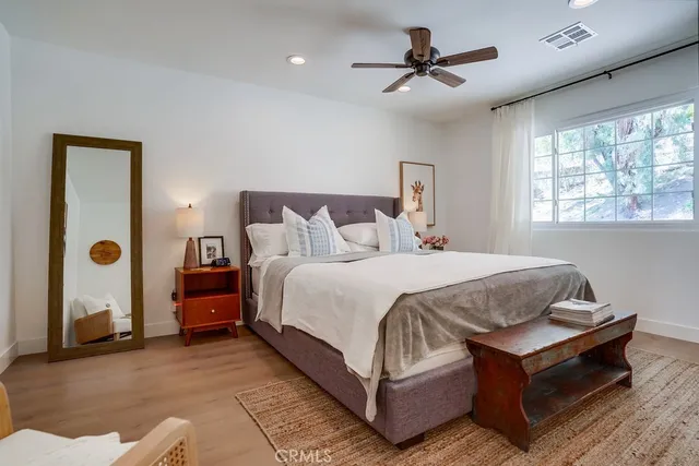 a kitchen with stainless steel appliances granite countertop a sink and a microwave
