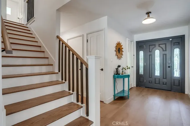 a kitchen with stainless steel appliances granite countertop a refrigerator sink and cabinets