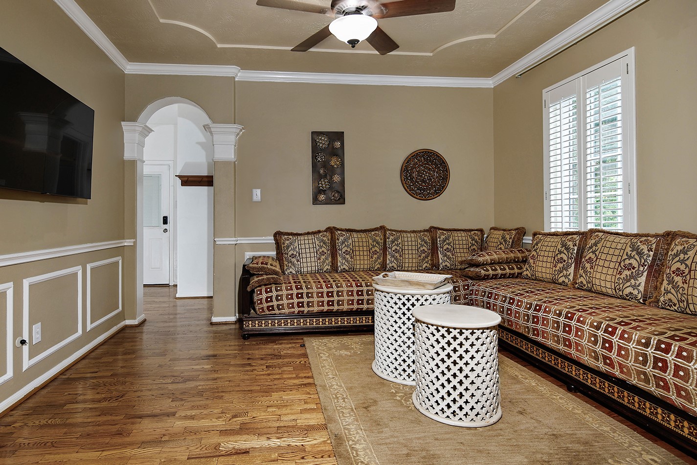 18834 Forest Elms Drive Spring, TX 77388 - Photo 18 of 47 a living room with furniture and a flat screen tv