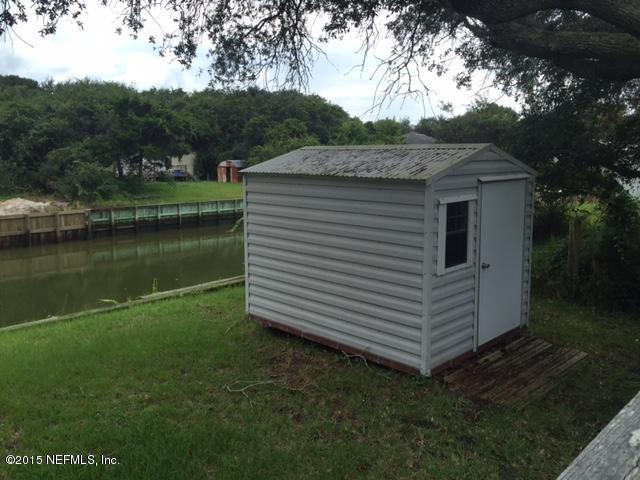 217 Barco Road St. Augustine, FL 32080 - Photo 16 of 18 a view of a house with a yard