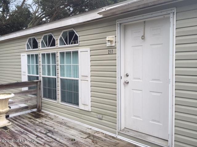 217 Barco Road St. Augustine, FL 32080 - Photo 4 of 18 a front view of a house with a window