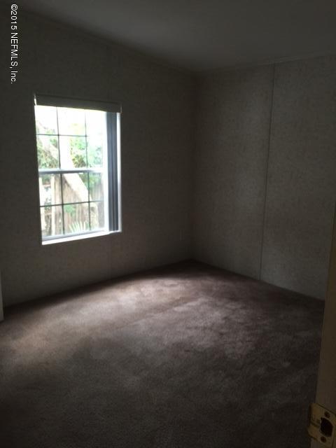 217 Barco Road St. Augustine, FL 32080 - Photo 9 of 18 a view of a window in an empty room