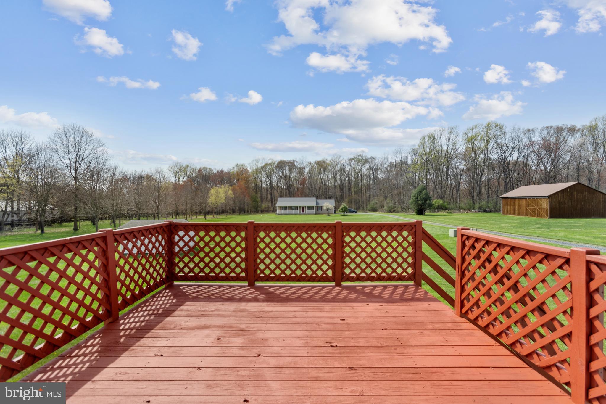 75 Loft House Road Rising Sun, MD 21911 - Photo 14 of 18 a view of a yard with wooden fence
