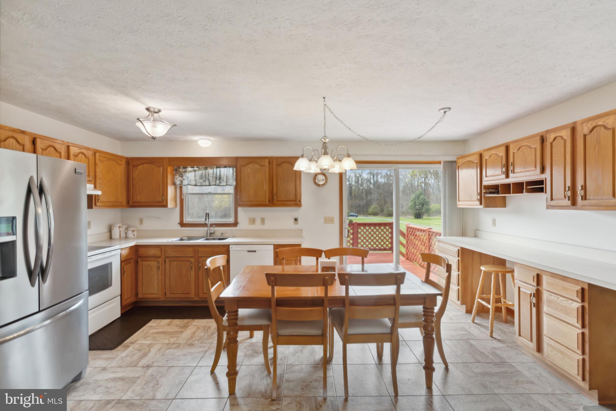 75 Loft House Road Rising Sun, MD 21911 - Photo 3 of 18 a large kitchen with a table and chairs
