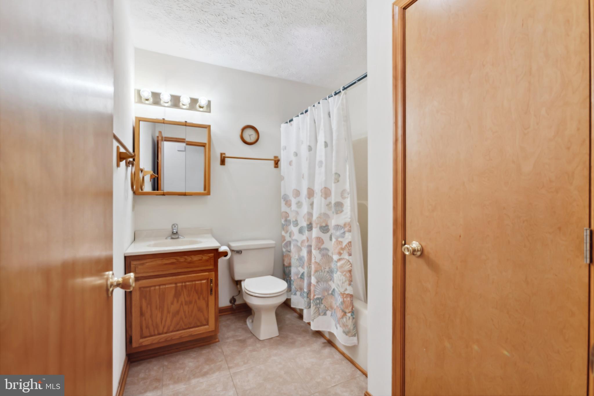 75 Loft House Road Rising Sun, MD 21911 - Photo 9 of 18 a bathroom with a toilet sink and shower
