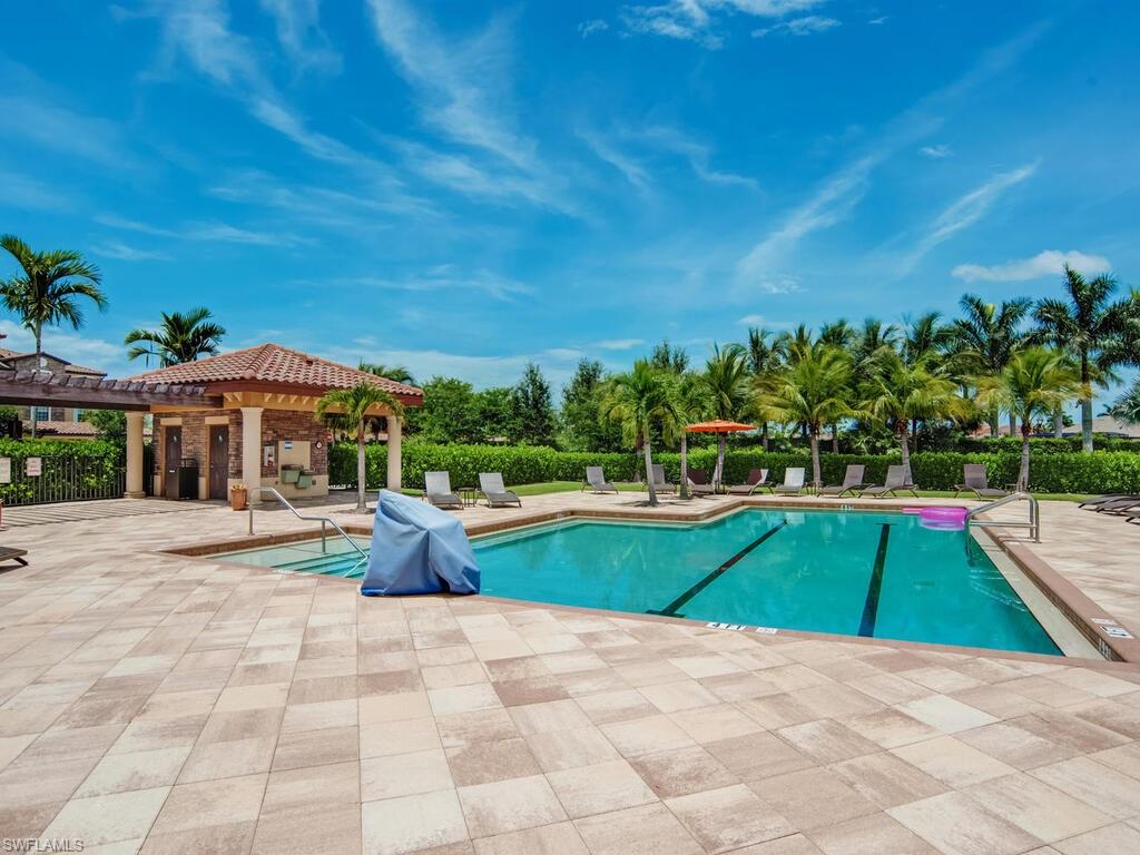 9735 Acqua Court, Unit 635 Naples, FL 34113 - Photo 22 of 33 a view of swimming pool with a patio