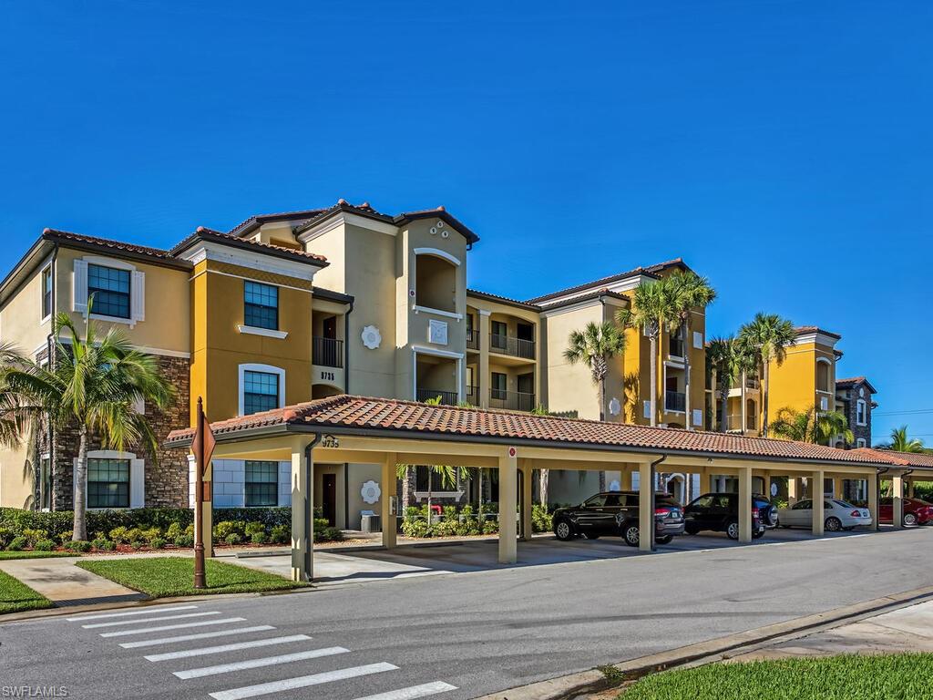 9735 Acqua Court, Unit 635 Naples, FL 34113 - Photo 3 of 33 front view of a building