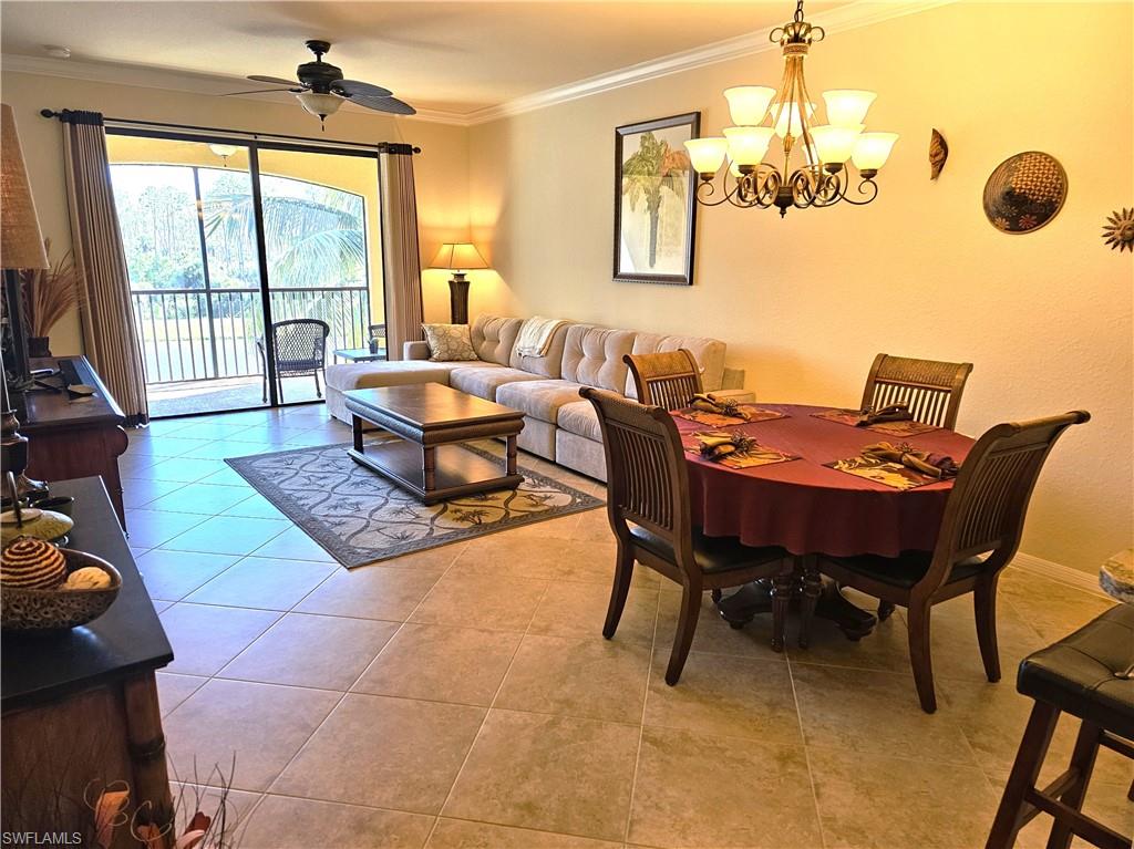 9735 Acqua Court, Unit 635 Naples, FL 34113 - Photo 5 of 33 a outdoor dining space with furniture and window