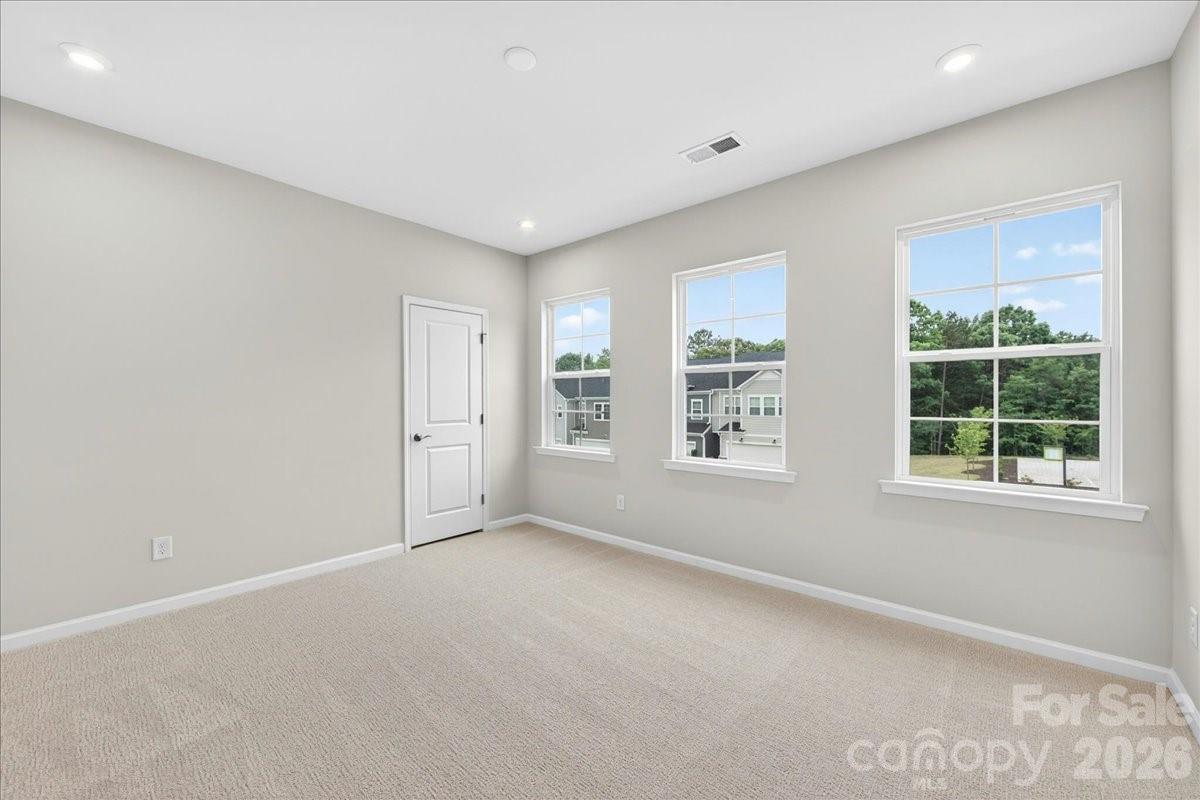 512 Webster Lane Cramerton, NC 28032 - Photo 25 of 28 an empty room with windows