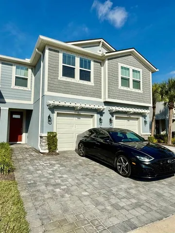 a car parked in front of a house