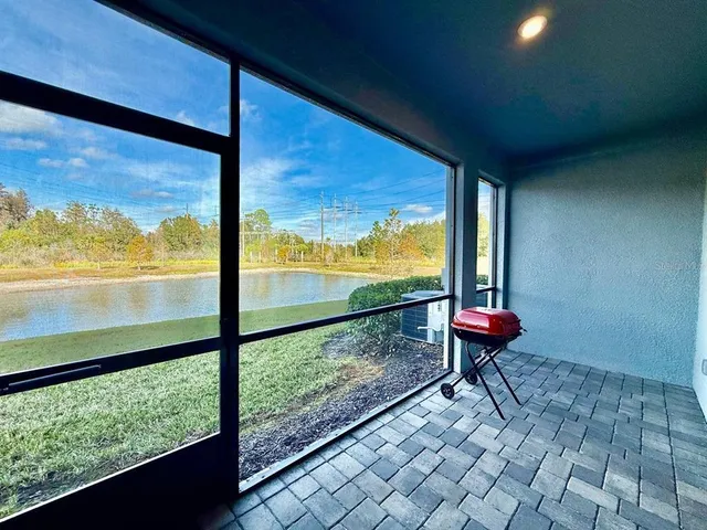 a view of an outdoor space with the ocean