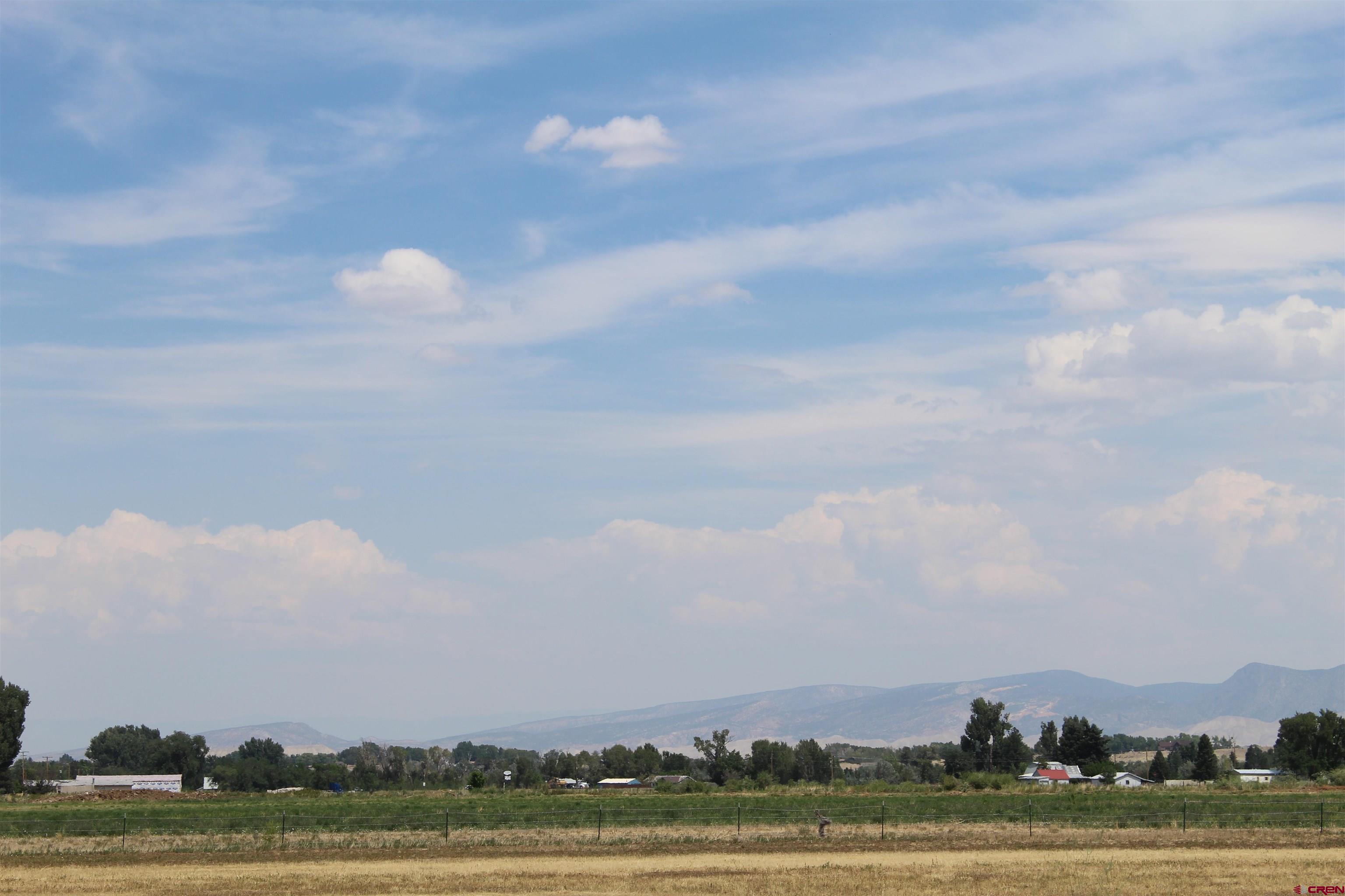 Lot 3 Solar Road Montrose, CO 81403 - Photo 6 of 8 a view of a lake and a city