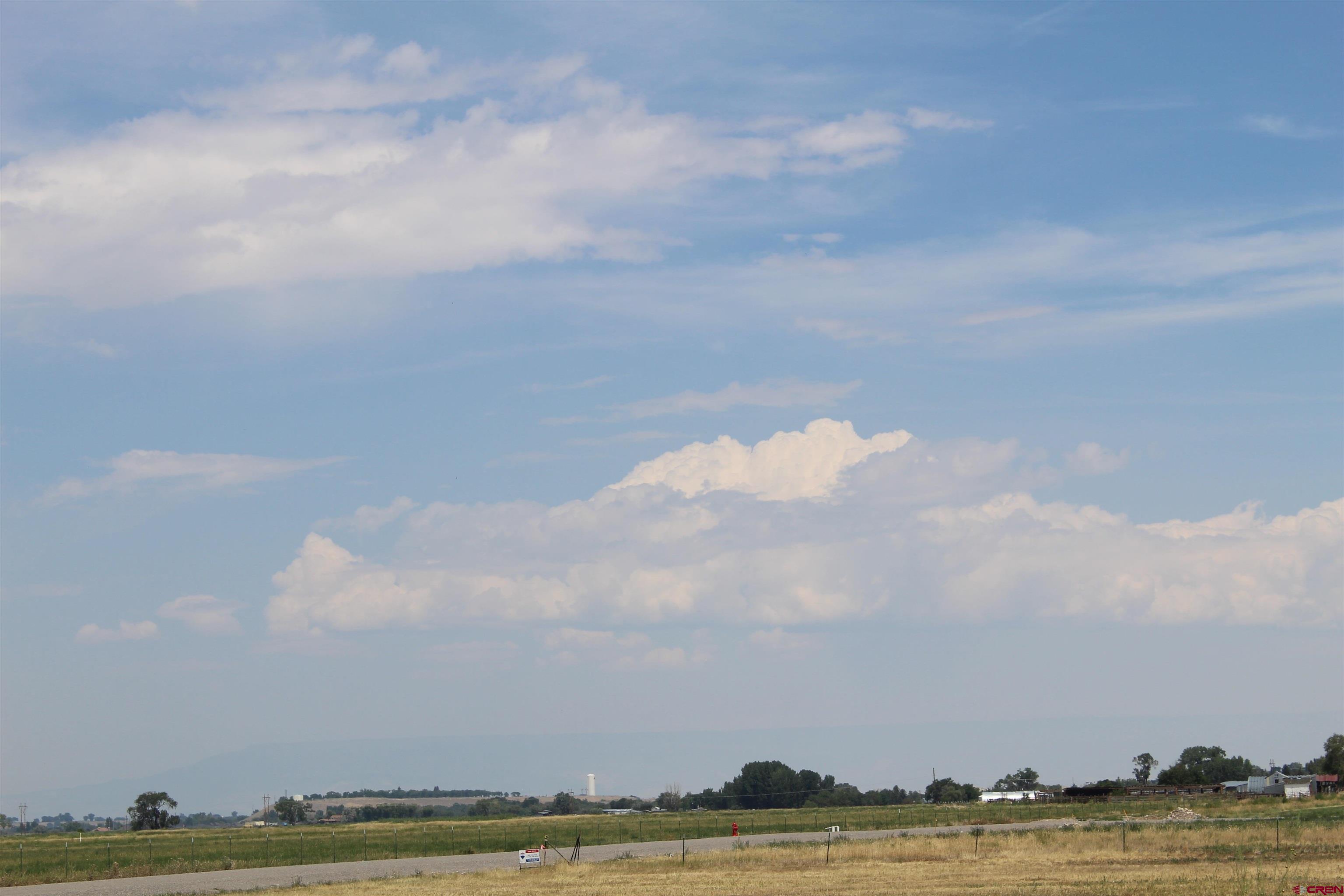 Lot 3 Solar Road Montrose, CO 81403 - Photo 8 of 8 a view of building and lake