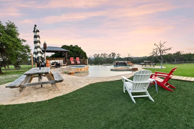 a living room with furniture and windows