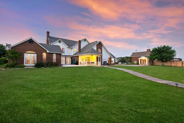 a bedroom with a bed and a fireplace
