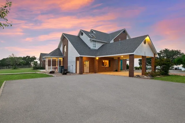 a bathroom with a sink double vanity and a shower