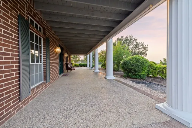 a bath tub sitting next to a window