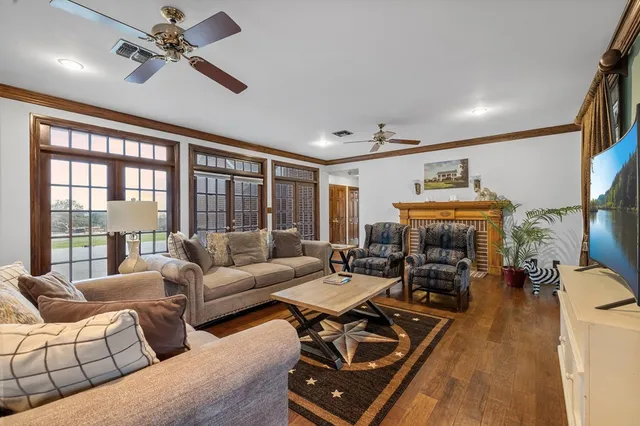 a bathroom with a sink double vanity granite and a mirror