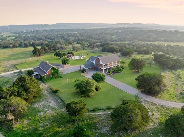 a view of a lake with a bench and lake view
