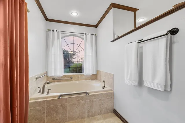 a view of a swimming pool with a yard