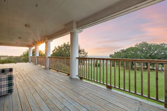 a bedroom with a bed and a closet with mirror