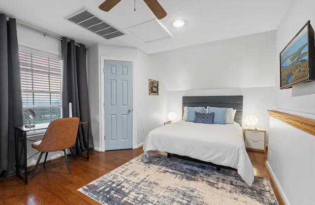 an aerial view of a house with a garden