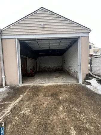 a view of a house with a garage