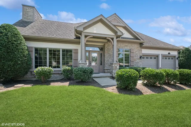 front view of a house with a yard