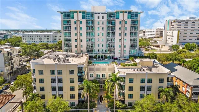 a large building with a table and chairs