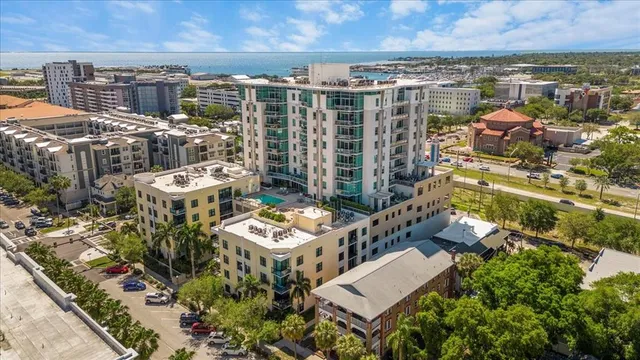 a view of city with ocean