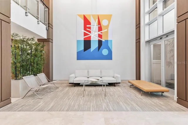 a living room with furniture and window