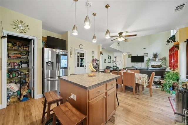 a bed room with a bed window and a chair