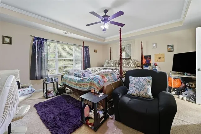 a bathroom with a sink a toilet and shower curtain