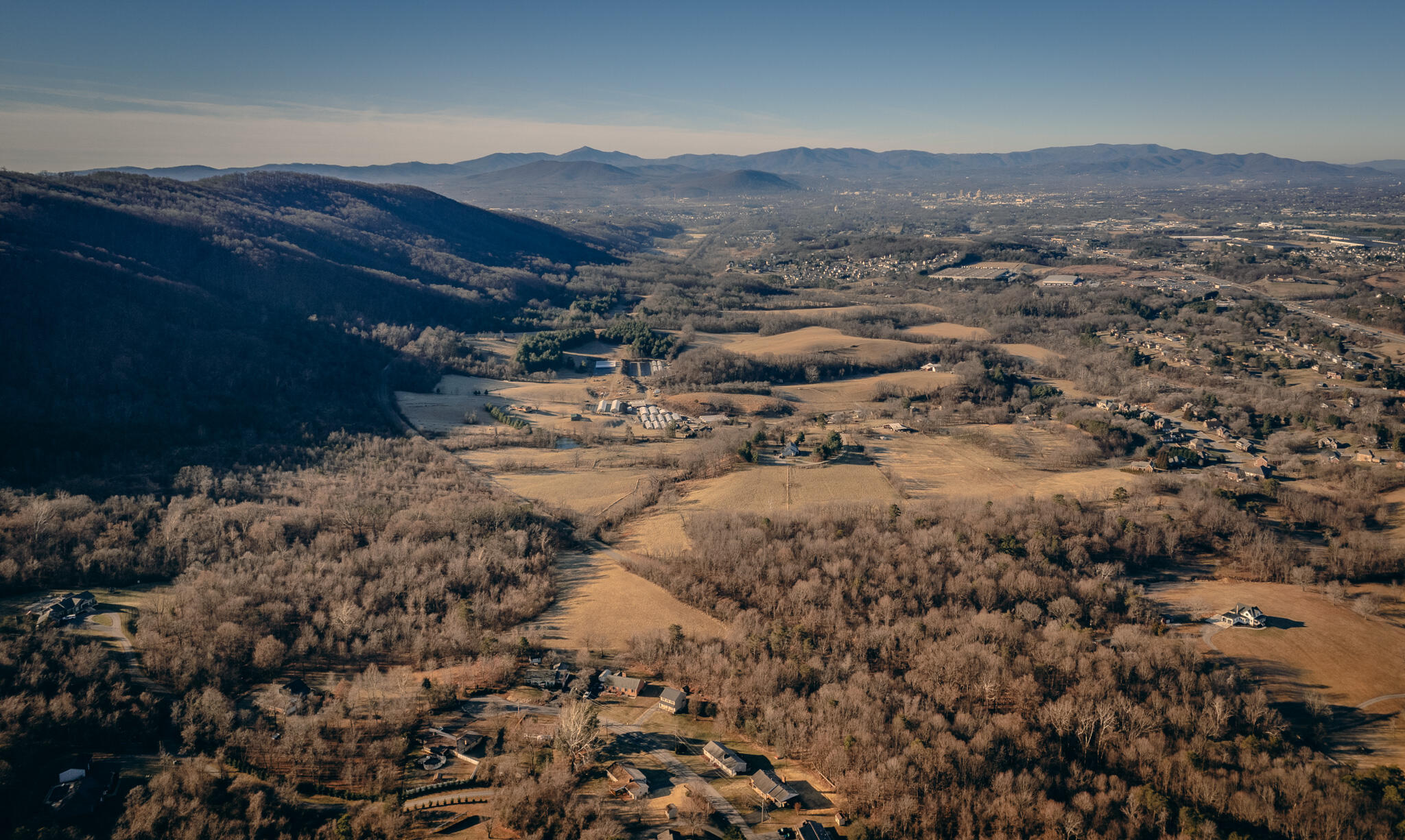 0 Glade Creek Road Roanoke, VA 24012 - Photo 1 of 21 a view of a town with mountains in the background