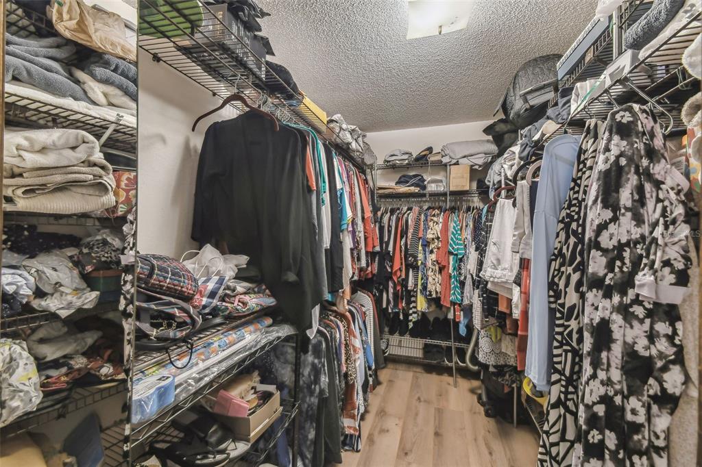 6938 Coronet Drive New Port Richey, FL 34655 - Photo 24 of 49 a view of walk in closet with clothes