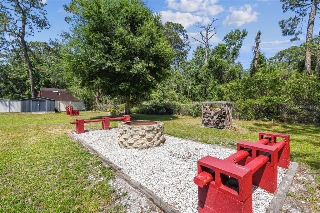 6938 Coronet Drive New Port Richey, FL 34655 - Photo 42 of 49 swimming pool with outdoor seating