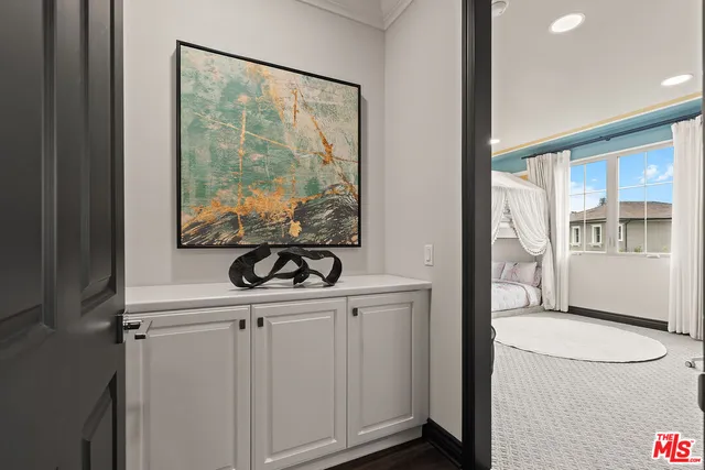 a bathroom with a granite countertop sink vanity mirror and shower