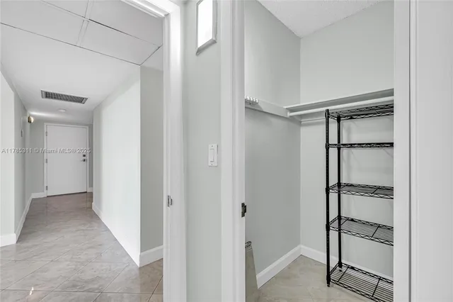 a view of a chairs and table in patio