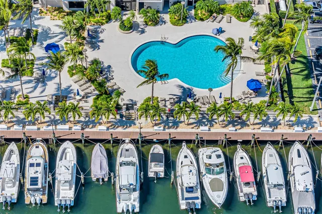 a living room filled with furniture and wooden floor