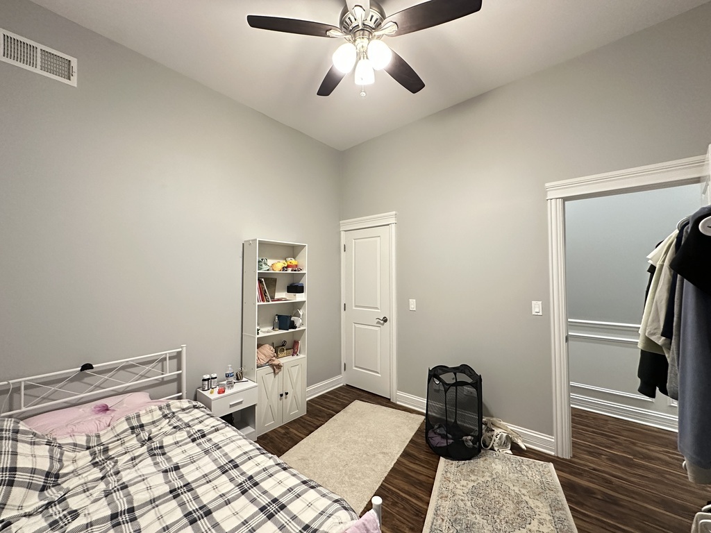 3336 West Irving Park Road, Unit 1 Chicago, IL 60618 - Photo 16 of 20 a bedroom with a bed and a walk in closet